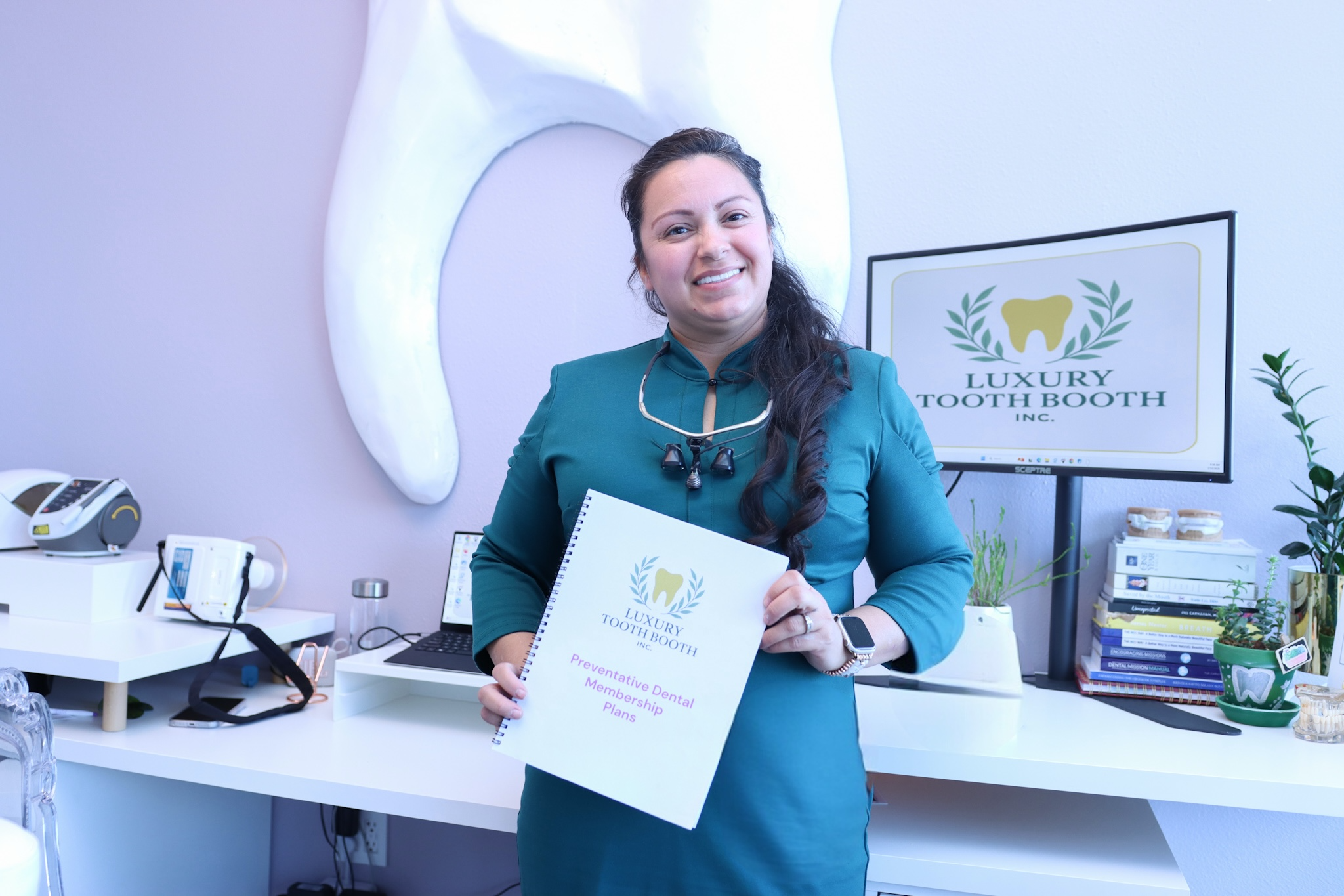 Sarah Tanner in the Luxury Tooth Booth office